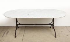 Oval Marble Topped Dining Table with Trestle Iron Base France mid 20th c - 3568005