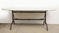 Oval Marble Topped Dining Table with Trestle Iron Base France mid 20th c - 3568006