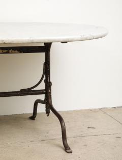 Oval Marble Topped Dining Table with Trestle Iron Base France mid 20th c - 3568008