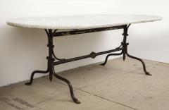 Oval Marble Topped Dining Table with Trestle Iron Base France mid 20th c - 3568010