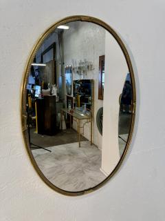 Oval Wall Mirror with Decorative Brass Frame 1970s - 4290545