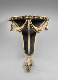 PAIR OF CARVED EBONIZED AND GILDED BRACKETS - 4696444