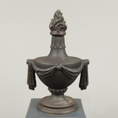 PAIR OF CAST IRON URN FINIALS WITH FLAME TOPS AND SWAGS - 1856505