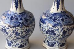 PAIR OF DUTCH DELFT BLUE AND WHITE WAISTED BOTTLE VASES CONVERTED TO LAMPS - 4574795