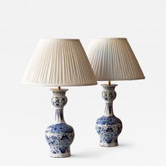 PAIR OF DUTCH DELFT BLUE AND WHITE WAISTED BOTTLE VASES CONVERTED TO LAMPS - 4575519