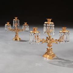 PAIR OF EARLY 19TH CENTURY GILT BRONZE AND LUSTRES THREE BRANCH CANDELABRA - 1985296