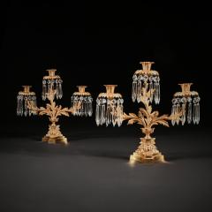 PAIR OF EARLY 19TH CENTURY GILT BRONZE AND LUSTRES THREE BRANCH CANDELABRA - 1985303