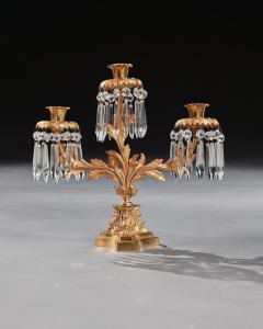 PAIR OF EARLY 19TH CENTURY GILT BRONZE AND LUSTRES THREE BRANCH CANDELABRA - 1985316