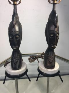 PAIR OF MID CENTURY CARVED WOOD AFRICAN BUST ON TRIPOD MARBLE BASE LAMPS - 771599