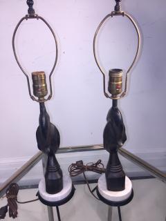 PAIR OF MID CENTURY CARVED WOOD AFRICAN BUST ON TRIPOD MARBLE BASE LAMPS - 771600