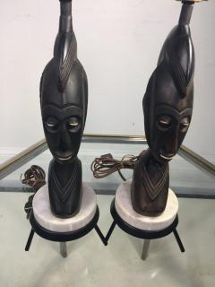 PAIR OF MID CENTURY CARVED WOOD AFRICAN BUST ON TRIPOD MARBLE BASE LAMPS - 771603