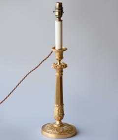 PAIR OF RESTAURATION PERIOD GILT BRONZE CANDLESTICKS CONVERTED TO TABLE LAMPS - 3551070