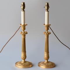 PAIR OF RESTAURATION PERIOD GILT BRONZE CANDLESTICKS CONVERTED TO TABLE LAMPS - 3551073