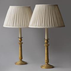 PAIR OF RESTAURATION PERIOD GILT BRONZE CANDLESTICKS CONVERTED TO TABLE LAMPS - 3874475