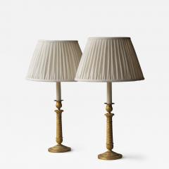 PAIR OF RESTAURATION PERIOD GILT BRONZE CANDLESTICKS CONVERTED TO TABLE LAMPS - 3878367