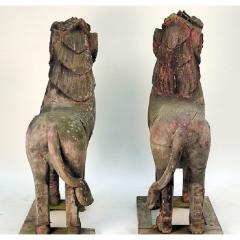 PAIR OF WOOD PALACE LIONS S E ASIA WEATHERED WITH MICA EYES - 1552071
