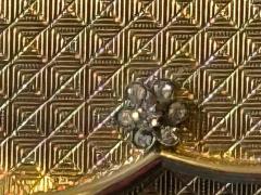 POLISHED GOLDTONE METAL CLUTCH WITH RHINESTONE FLORET ACCENTS - 4706814