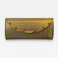 POLISHED GOLDTONE METAL CLUTCH WITH RHINESTONE FLORET ACCENTS - 4707976