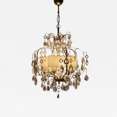 Paavo Tynell An Elegant Paavo Tynell Crystal Brass Chandelier Model 1487 for Taito 1940s - 4043248