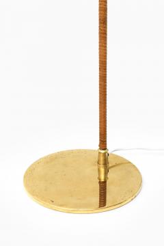 Paavo Tynell Floor Lamp in Brass and Cane by Paavo Tynell 1950s - 4470968
