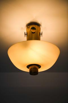 Paavo Tynell Scandinavian Modern Ceiling Lamp in Brass Opaline Glass by Paavo Tynell 1950s - 4736425