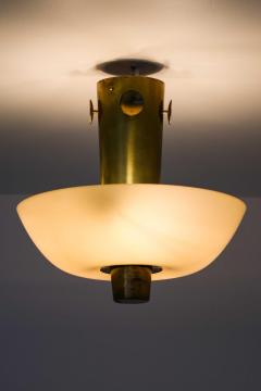 Paavo Tynell Scandinavian Modern Ceiling Lamp in Brass Opaline Glass by Paavo Tynell 1950s - 4736426