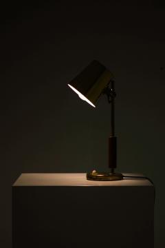 Paavo Tynell Table Lamp in Brass and Teak by Paavo Tynell 1950s - 4555492