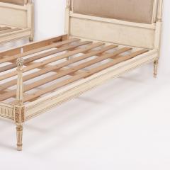 Painted carved and gilt Louis XVI style twin size beds circa 1950  - 3490502