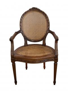 Pair Louis XVI Style Carved Walnut Arm Chairs with Caned Back Seat - 3978127