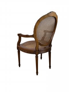 Pair Louis XVI Style Carved Walnut Arm Chairs with Caned Back Seat - 3978132