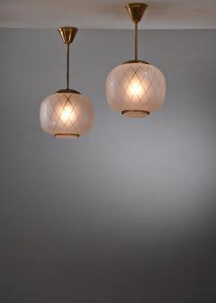 Pair frosted glass and brass pendants - 3127117