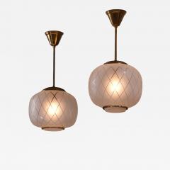 Pair frosted glass and brass pendants - 3130544