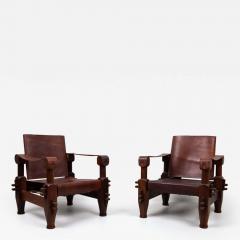 Pair of 1960s hardwood and leather armchairs - 4306503