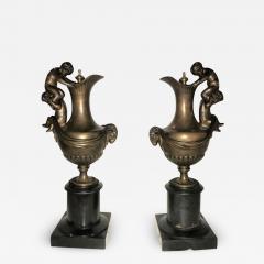 Pair of 19th Century Urns on Marble Stands Bearing Cherubs and Rams Heads - 2948695