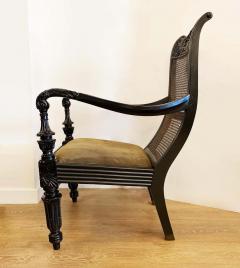 Pair of Anglo Indian Carved Ebony and Caned Armchairs - 2310901