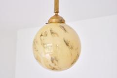 Pair of Art Deco Pendants in Brass and Marbled Glass De La Mar Theatre 1940s - 3381924