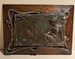 Pair of Art Nouveau Metal and Oak Figural Wall Plaque - 4658907