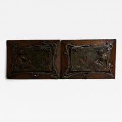 Pair of Art Nouveau Metal and Oak Figural Wall Plaque - 4690138