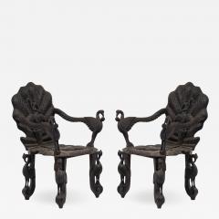 Pair of Burmese Ebonized Carved Arm Chairs - 1407885