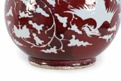 Pair of Chinese Burgundy and White Botanical Motif Porcelain Vases - 4629313