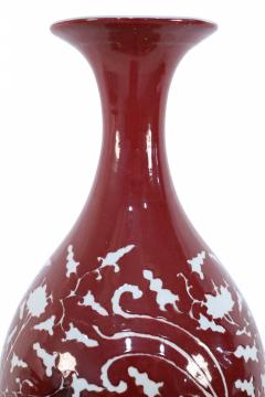 Pair of Chinese Burgundy and White Botanical Motif Porcelain Vases - 4629314