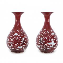 Pair of Chinese Burgundy and White Botanical Motif Porcelain Vases - 4631026