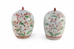 Pair of Chinese White and Pink Cherry Blossom Motif Lidded Porcelain Urns - 4408571