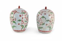 Pair of Chinese White and Pink Cherry Blossom Motif Lidded Porcelain Urns - 4408572