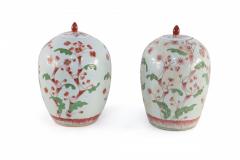 Pair of Chinese White and Pink Cherry Blossom Motif Lidded Porcelain Urns - 4408573