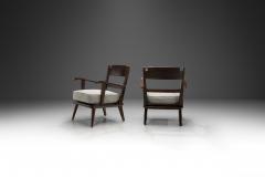 Pair of Dark Stained Pine Armchairs Europe First half of the 20th century - 3898213