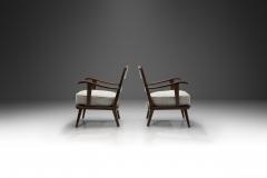 Pair of Dark Stained Pine Armchairs Europe First half of the 20th century - 3898214