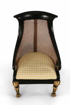 Pair of English Regency Style Carved Black and Giltwood Cane Back Armchairs - 2798299