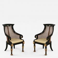 Pair of English Regency Style Carved Black and Giltwood Cane Back Armchairs - 2798592