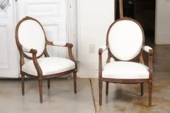 Pair of French 1850s Louis XVI Style Walnut Oval Back Upholstered Armchairs - 3441637